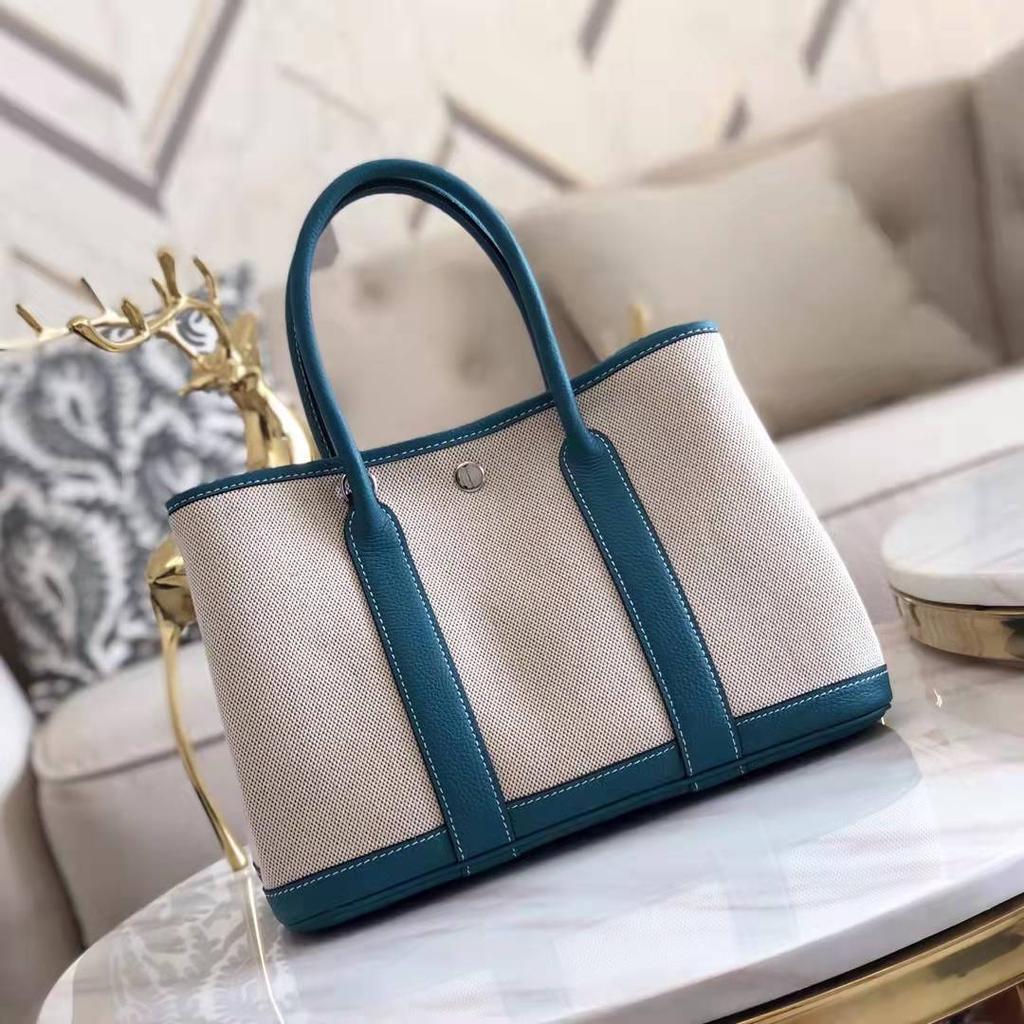 Grensoverschrijdende nieuwe canvas tas met eerste laag koeienhuid voor dames, tuin handtas, echt leer, contrasterende kleur, schoudertas, messenger tas, tote bag