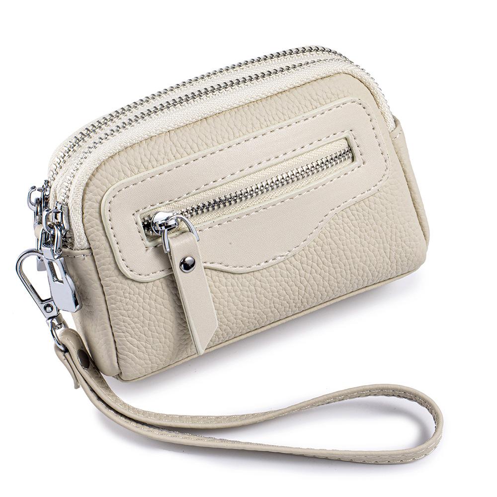 

Новая женская мини-сумка Простая сумка-кошелек на запястье Натуральная коровья кожа Большая вместимость Двойная молния Многофункциональная монетница