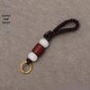 Brass Hand-Woven Five Emperors' Coin Yellow Rope Keychain with Red Rope Knot and Auspicious Cloud Pendant