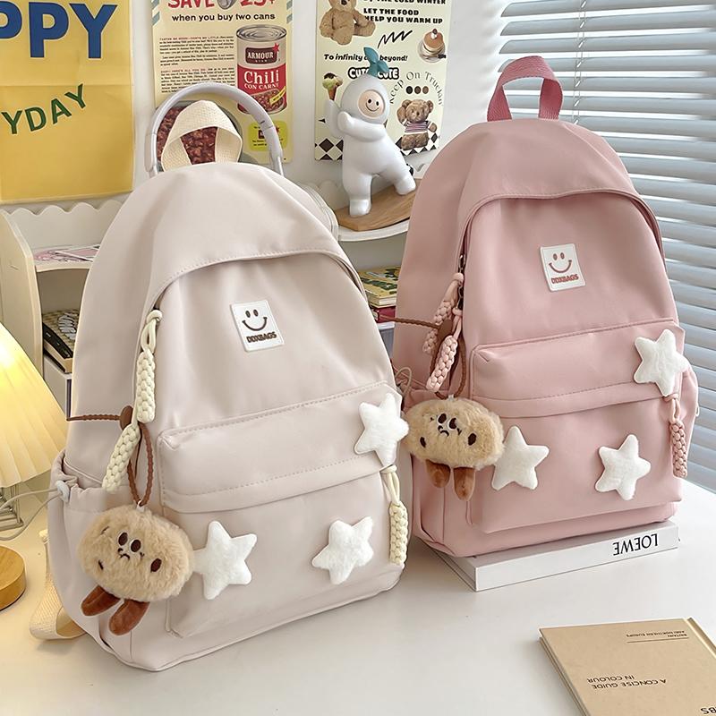 Cute Pink Backpack for Girls Fashionable Star Decorated School Bag with Plush Charm Ideal for Daily Use and School Cute Style Ba