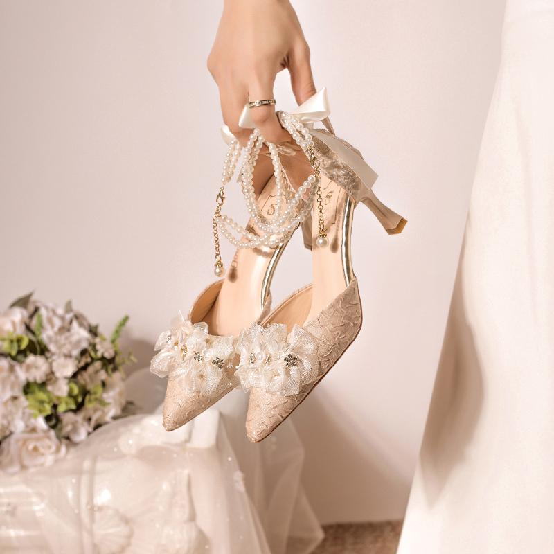 Fashion French pearl superior sense one-line buckle sandals fairy temperament pointy thin heel hollow flower with skirt new high heels