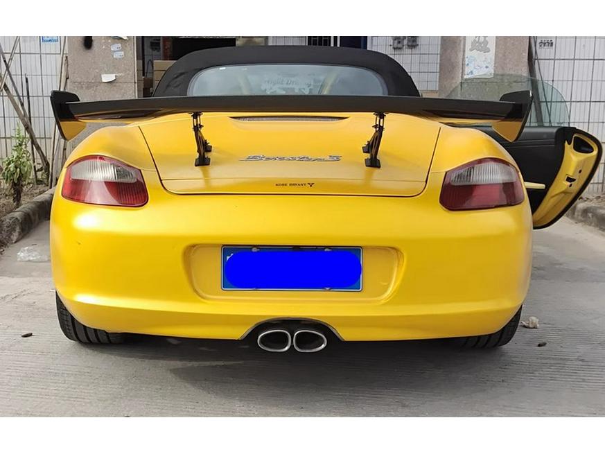 GT Universal Perforated Rear Spoiler Kit: Includes Bracket, Wind Deflector, Roof Spoiler, Rear Diffuser, Side Skirts, and Front Lip.