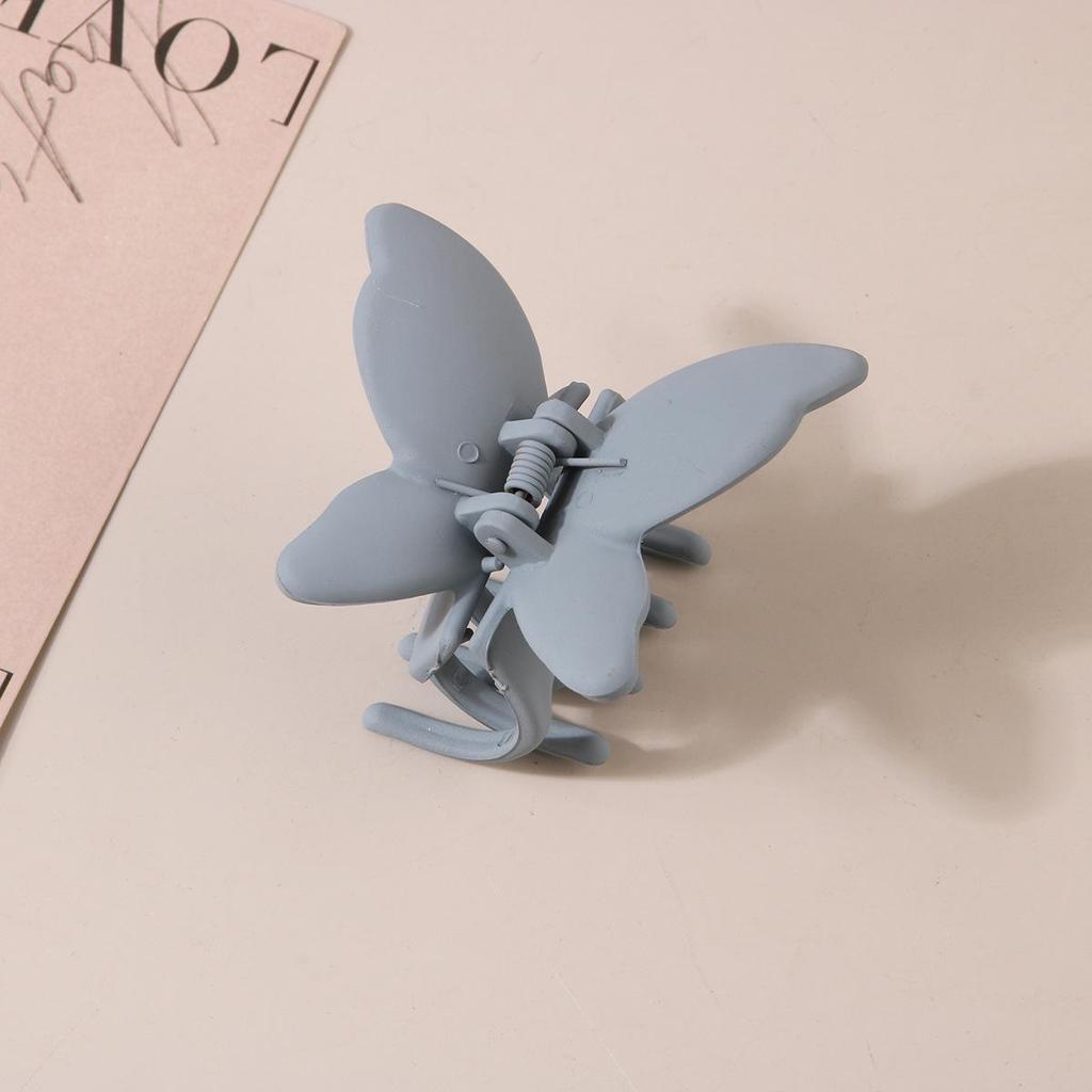 Matowy klips do włosów motylkowy z efektem farby w sprayu