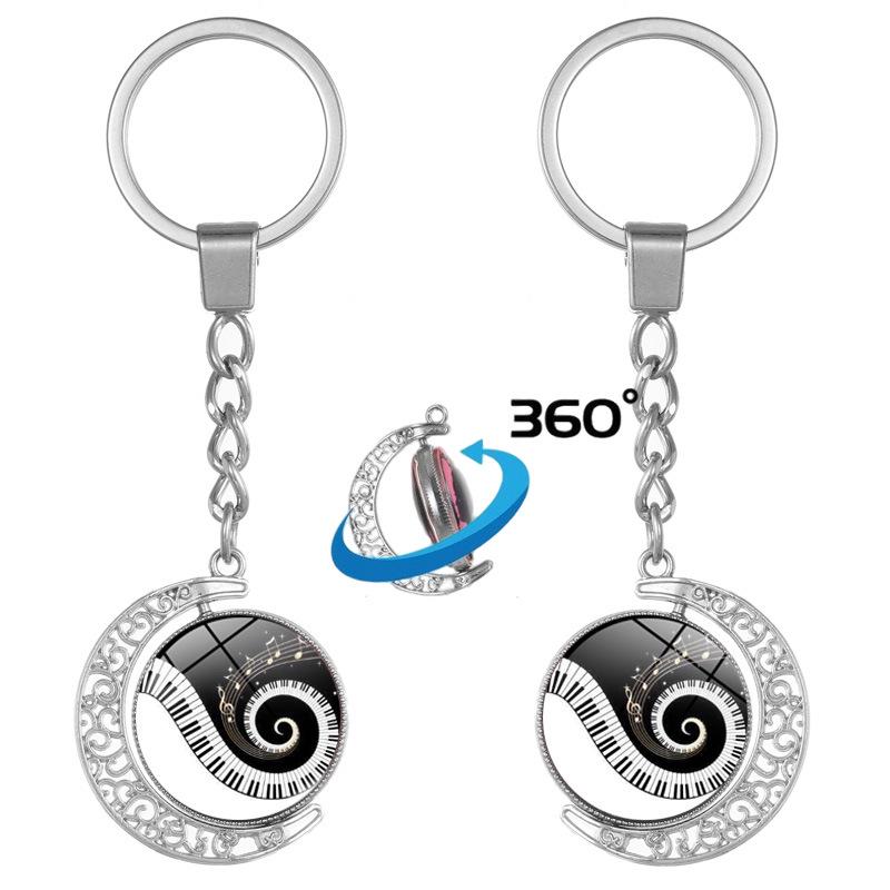Heart-Shaped Rotating Piano Key Pendant Keychain with Gem and Musical Notes Ornament