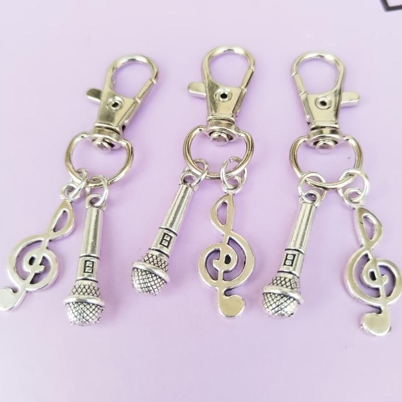 Creative Hip Hop Themed Keychain Featuring Microphone And Note Pendant Suitable For Music Fan