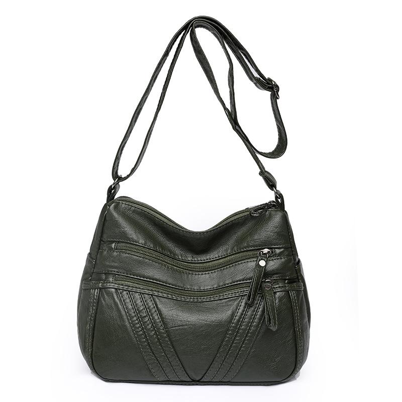 Damska skórzana torba dla matki w średnim wieku. Torba na ramię typu crossbody. Torba z wieloma kieszeniami
