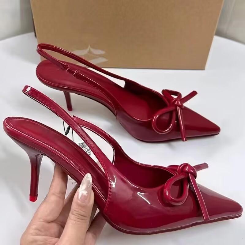 Sandales à nœud pointu en cuir verni rouge pour femmes printemps et automne 2025 nouveau talon aiguille à bouche légère français talons hauts à une bride pour femmes
