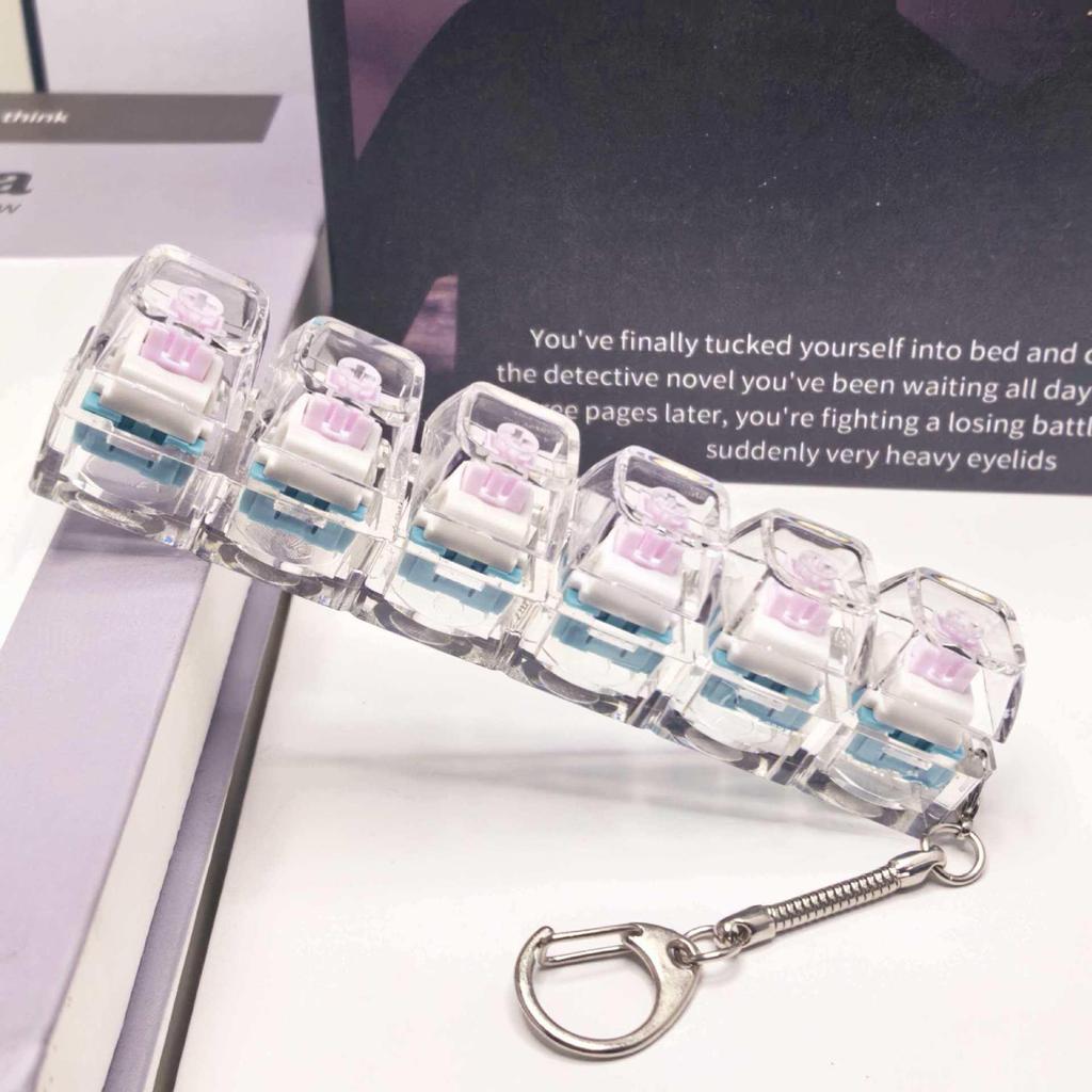 Stummer mechanischer Tastatur-Schlüsselanhänger mit 5,6 Kreuzachsen-Tasten und hochtransparenten Tastenkappen; Dekompression Spielzeug.