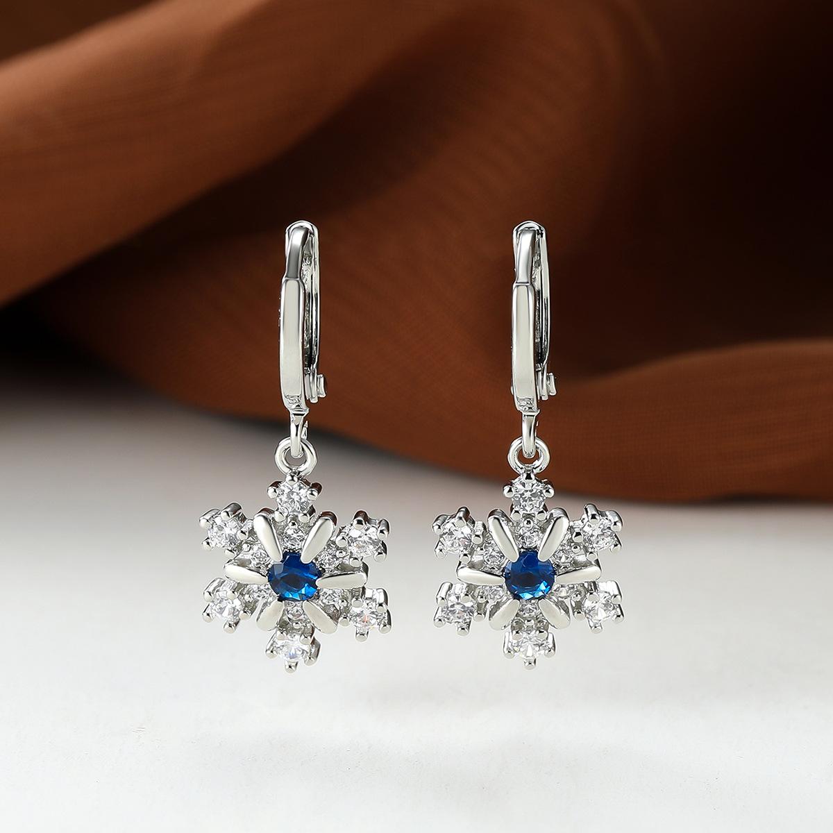 Explosive snowflake silver inlaid blue diamond earrings, bright and full of temperament