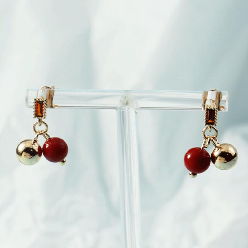 

Festive Red Bean Stud Earrings: High-End Christmas & New Year Style for Girls Red Ball Earrings (Platinum)