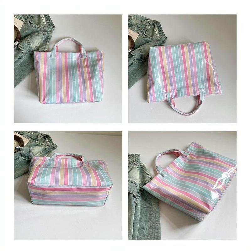 This Water-Resistant Pvc Tote Bag Features A Pink And Blue Striped Design, A Large Capacity, And Is Suitable For Beach Shopping,