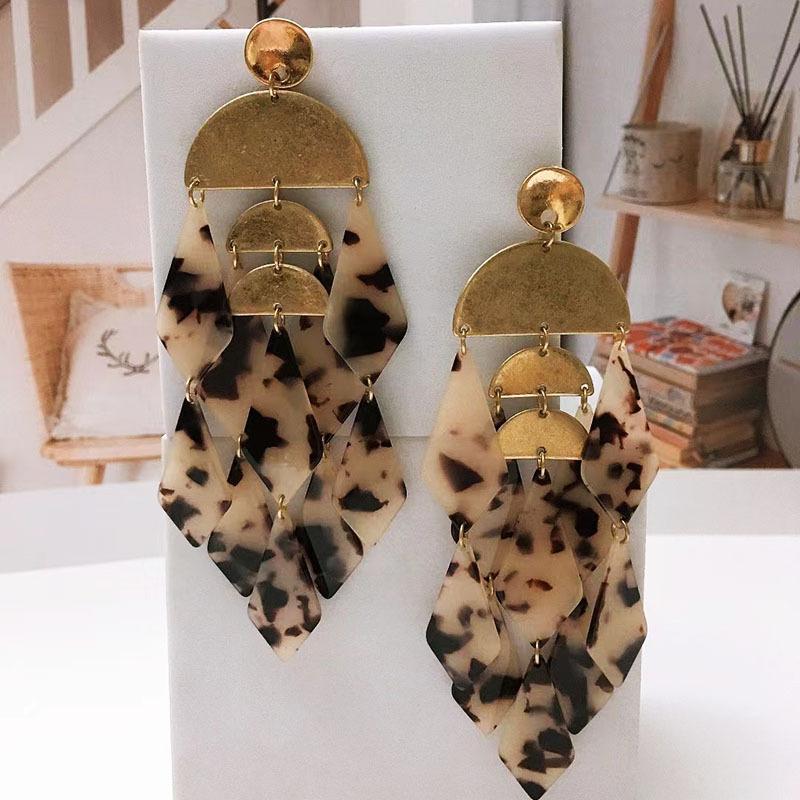 

Leopard print diamond earrings золотий