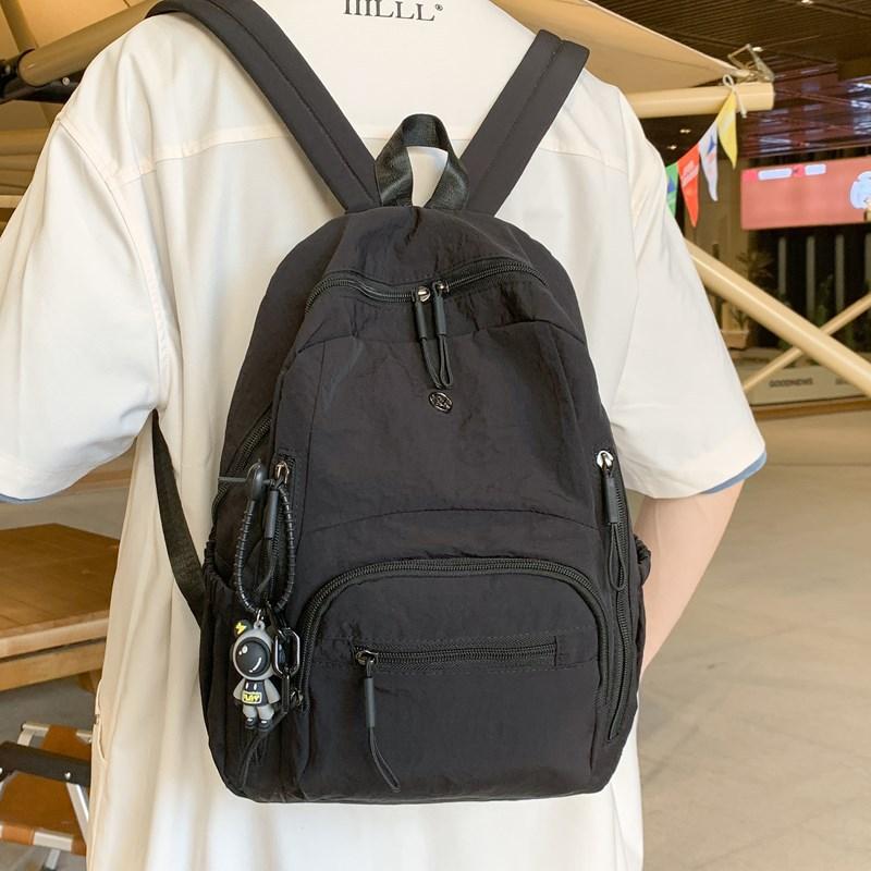 Lightweight schoolbag female solid color water-proof multi-pocket computer commuting backpack college student class travel backpack