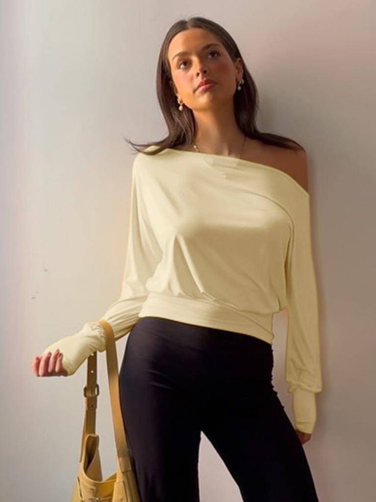 European and American women's clothing autumn ins new fashion solid color slanted shoulder long-sleeved pleated navel top T-shirt women