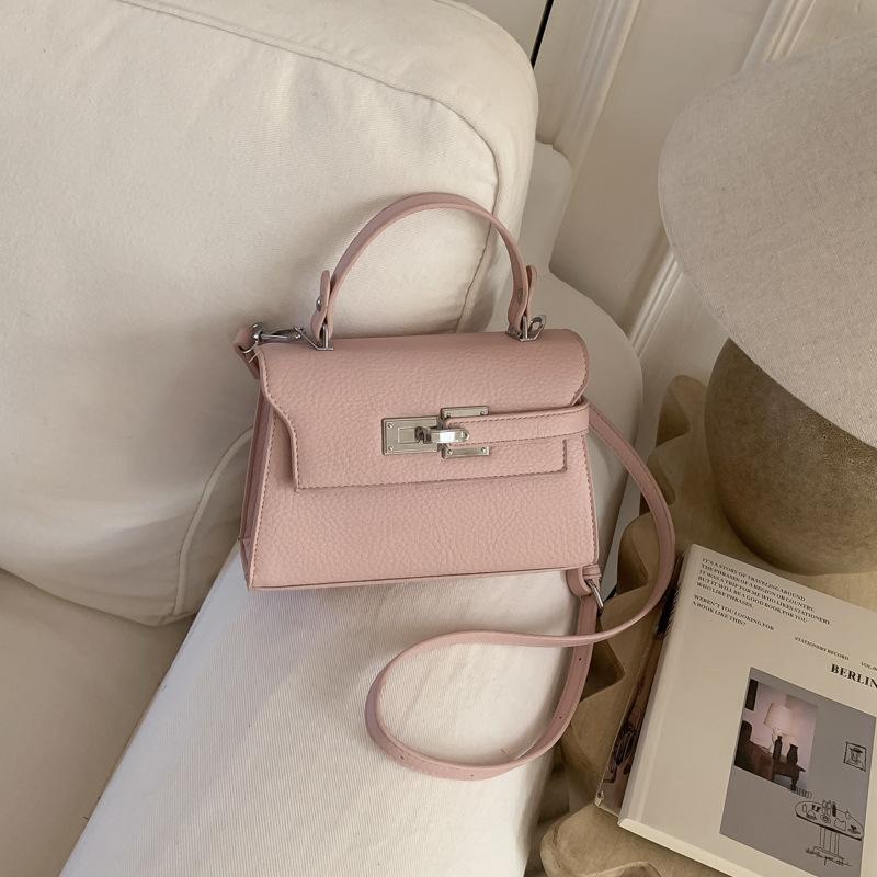 Elegant Commuting Bag for Work with A Chic Kelly Bag Style, Single-shoulder Cross-body Design.