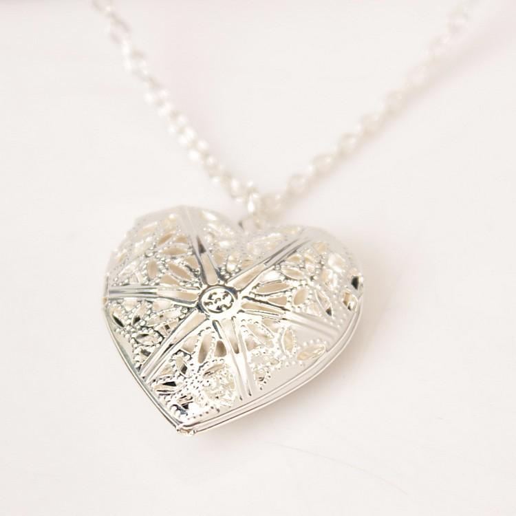 Charming 9 Designs Hollow Round Heart Key Flower Metal Box Glow in Dark Necklace Charming 9 Designs Hollow Round Heart Key Flower Metal Box Glow in Dark Necklace