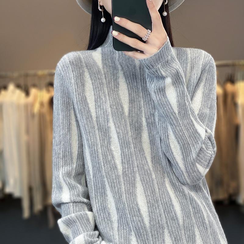 Design sense semi-turtleneck knitted sweater women's autumn and winter new high-end loose and thin bottoming shirt top