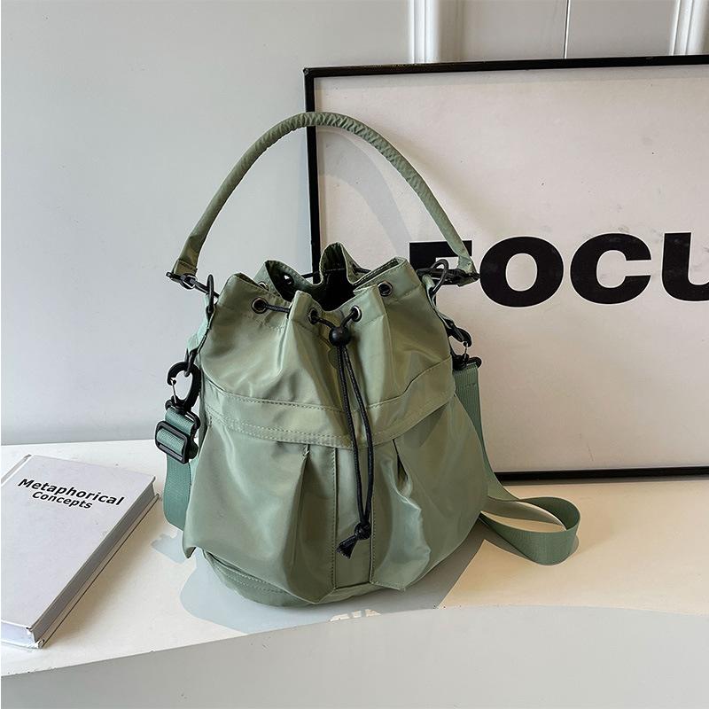 

Супер крутая индивидуальная нейлоновая водонепроницаемая сумка-ведро большой вместимости повседневная дорожная сумка модная одно плечо через плечо с завязкой на руку