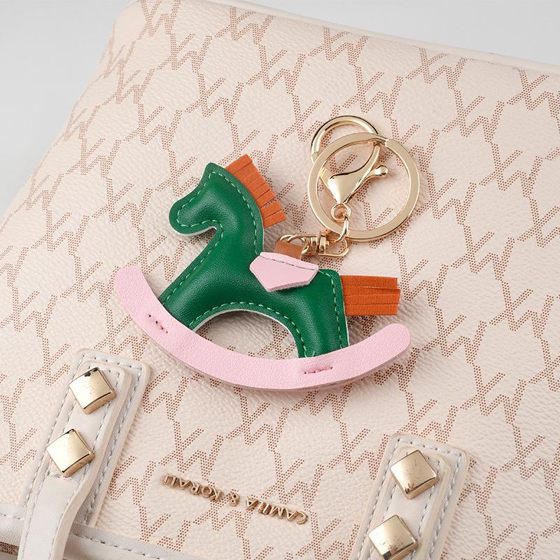 Innocent & Cute Rocking Horse Keychain: Creative Couple's Cartoon Cotton-Filled Decoration for Bags