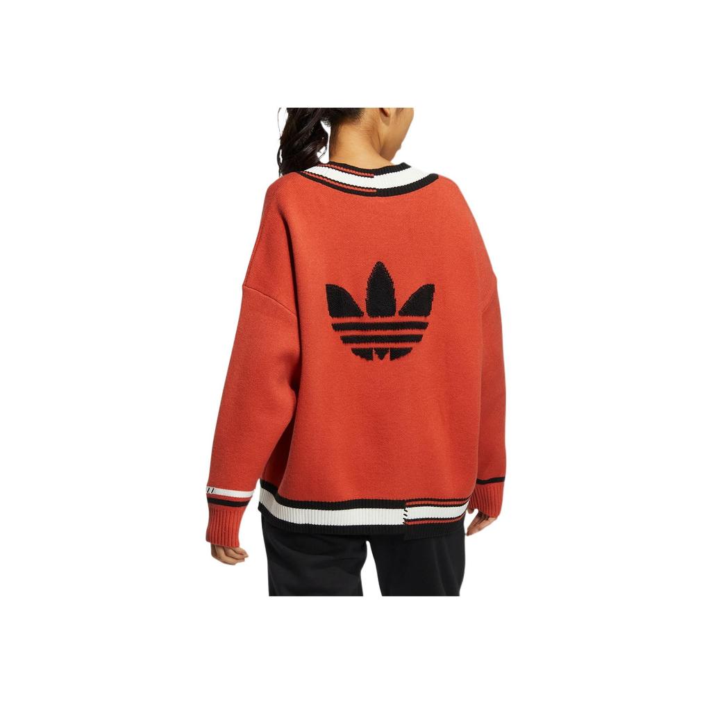 adidas Originálny pletený vianočný sveter s výstrihom do V a vyšívaným logom pre ženy, oranžový HS9520