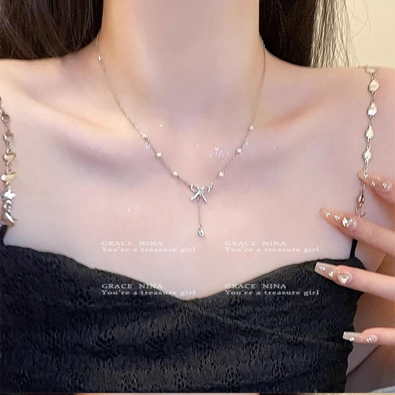 A frigid style bow imitation pearl necklace femininity high sense Internet celebrity versatile collarbone chain neck accessories