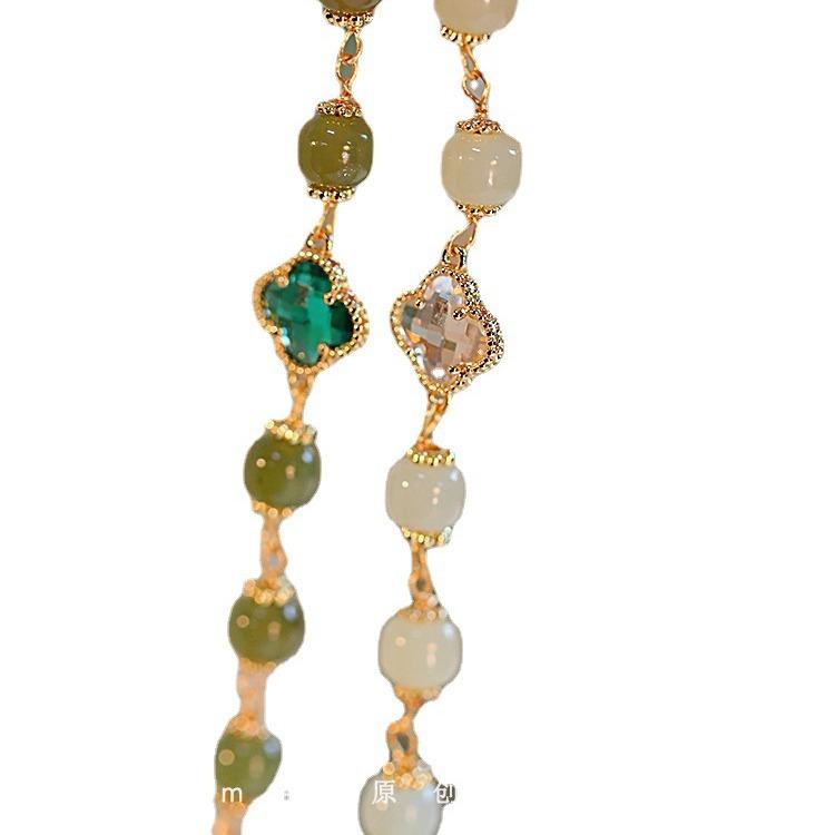 Clover*Hetian jade four-leaf clover bracelet, lucky niche design, new model that enhances complexion
