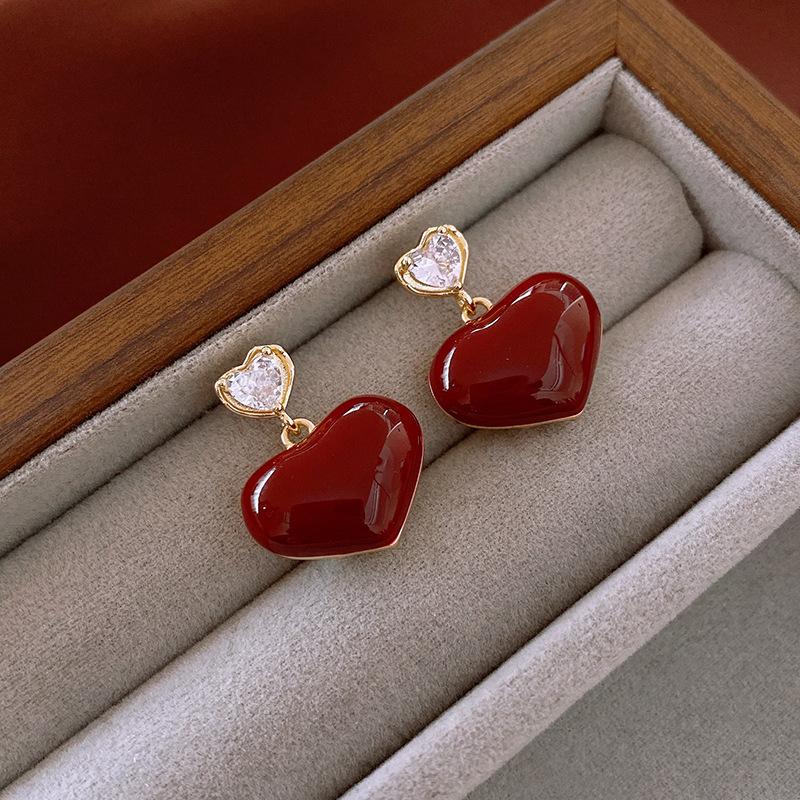 

Посеребренные серьги-гвоздики из настоящего золота с цирконом в виде сердца, легкая роскошь, высокий класс, нишевые серьги для женщин