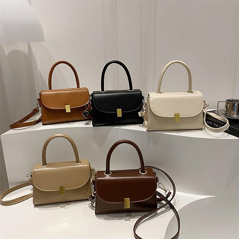 Winter neue vielseitige Damentaschen, tragbare kleine Taschen, Retro-Trend Nischentextur Schulter-Umhängetaschen