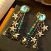 1 Pair of Retro Blue Multi-element Star and Moon Round Face Leaf Fringe Earrings