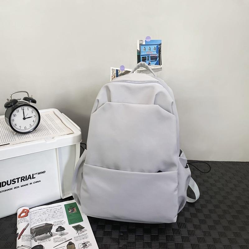 

Школьный рюкзак новый колледж стиль школьный рюкзак однотонный большая вместимость рюкзак женский студент колледжа простой рюкзак женский Pendant + 5 серый