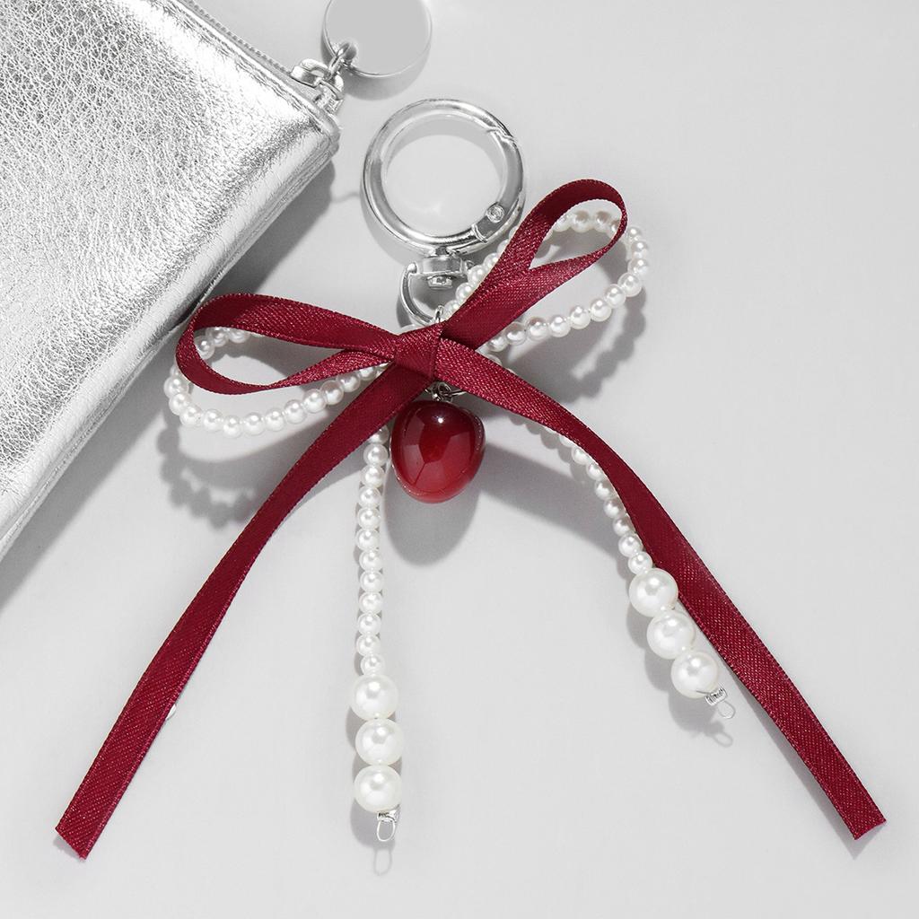 Weinrote Schleife Kirschanhänger Schlüsselanhänger Damen Süße Weiße Perle Schleife Rucksack Schlüsselring Schmuck Taschen Dekoration Freundschaftsgeschenke