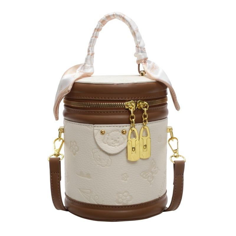 High-quality Cute Embossed Light Luxury High-end Portable Cylinder Bag Niche Design Versatile Temperament Messenger Women's Bag