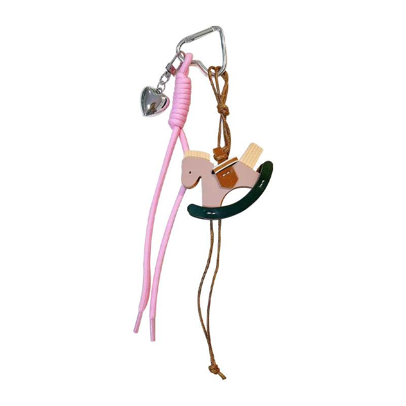 Creative leather rocking horse keychain cute trendy cool PU Trojan horse pendant men and women versatile bag hanging accessories small gifts