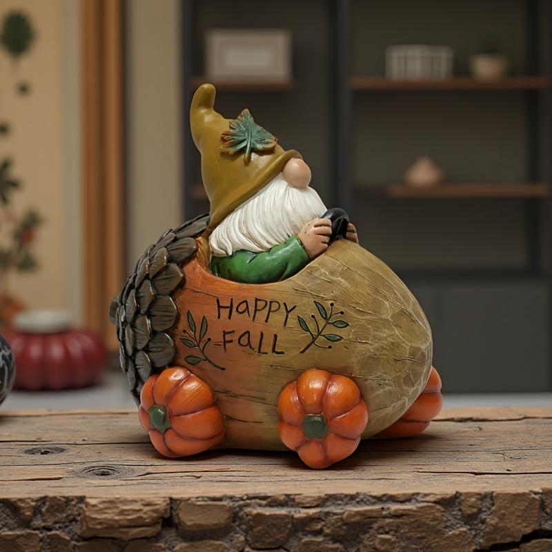 

1 шт. Статуэтка садового гнома «Осенний урожай», тележка из сосновых шишек с колесом-тыквой, декоративное забавное украшение в виде гнома и тележки из сосновых шишек, подходит для двора, газона, крыльца Resin