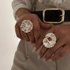 Hollow flower ring European and American niche design sense irregular spiral imitation pearl open ring jewelry women