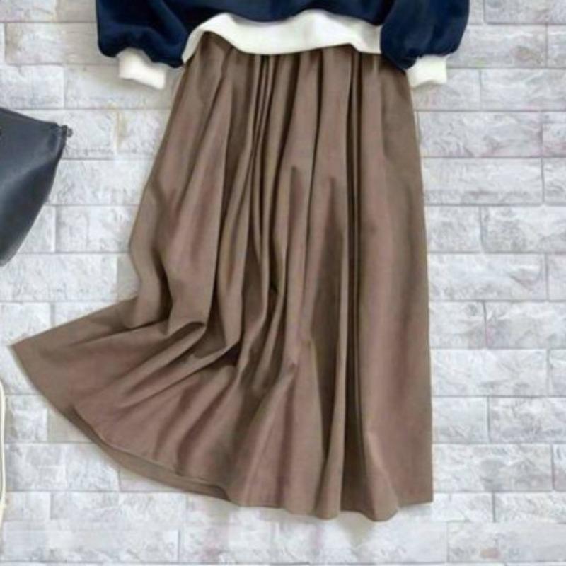 New solid color top + pleated skirt knitted suit fashionable