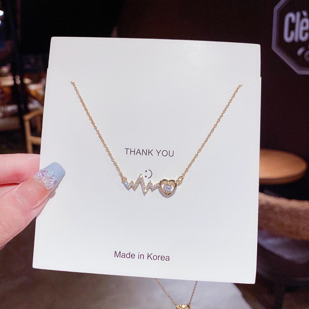 

2025 Женское ожерелье-подвеска в виде молнии из титановой стали высокого класса – Легкая роскошь, цепочка для ключицы для свитеров