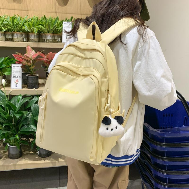 Student Schoolbag New Simple Backpack Large Capacity Junior High School Student Leisure Bag Going Out Light Backpack