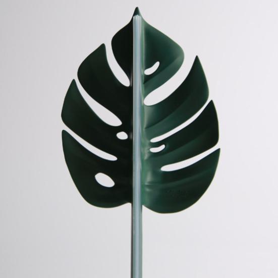 Nástroj na čištění sprchové stěrky ve tvaru zeleného listu