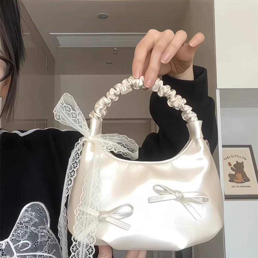 Summer New Bow Armpit Bag Women's Leisure Commuting Niche Pleated Cloud Bag Dumpling Bag
