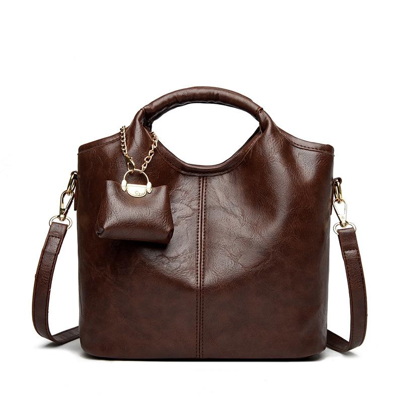 A Fashionable and Retro Hand-held Bucket Bag for Women A High-end and Versatile Single-shoulder Crossbody Bag