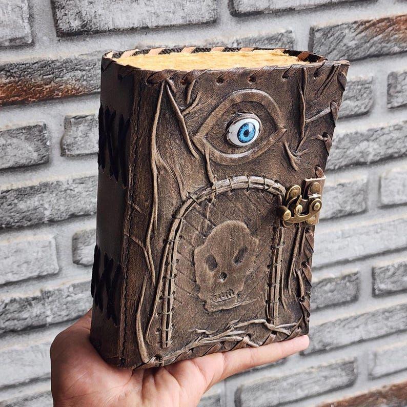 Gothic Spellbook Journal with Skull & Eye Design | 200 Page Fantasy Leather Notebook | Dark Aesthetic Grimoire with Lock, Book of Shadows