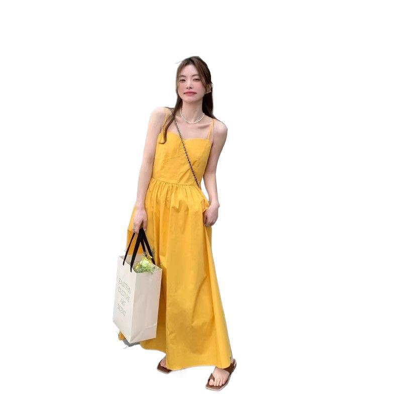 Dopamine yellow sleeveless suspender dress women's summer French feeling seaside vacation super fairy beach skirt women's clothing