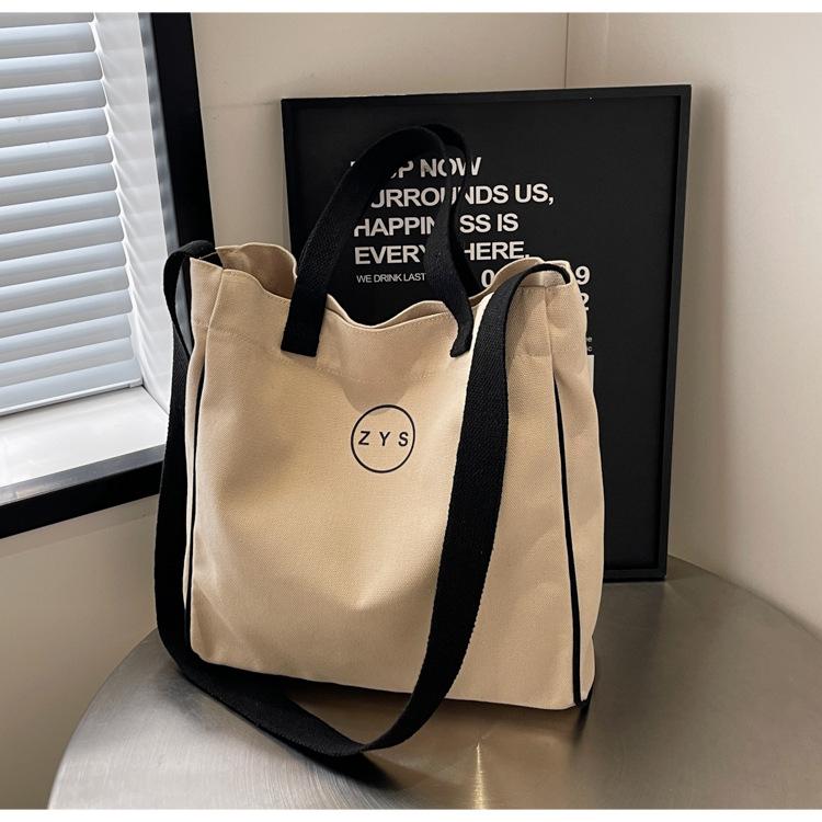 

Premium textured canvas bag women s 2025 summer new versatile commuter large-capacity shoulder oblique span bag 30*10*30 хаки