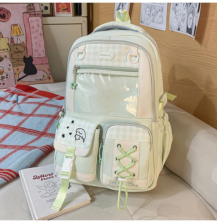 Cartoon Girls Backpack With Nylon Material And Padded Shoulder Straps For School Use