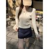Pull tricoté en laine à col polo torsadé vintage automne nouveau pull d'apprêt de niche manches longues court pour femmes