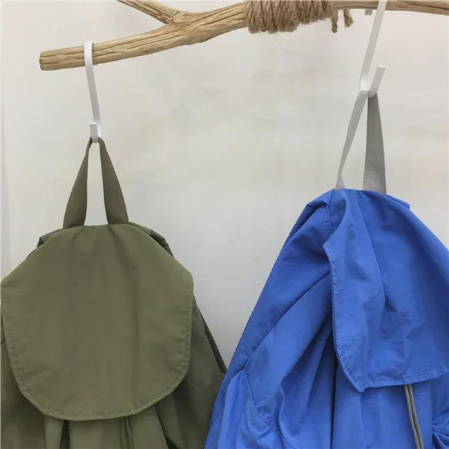 Introducing the New Simple Nylon Drawstring Backpack: a Spacious, Versatile Bag Perfect for Students, Leisure Trips, and Sports Activities.