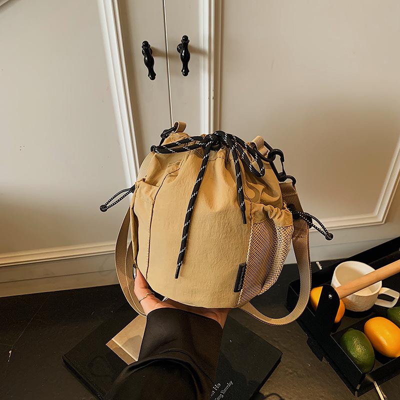 Niche fashion crossbody drawstring bucket bag new casual simple versatile commuter shoulder bag