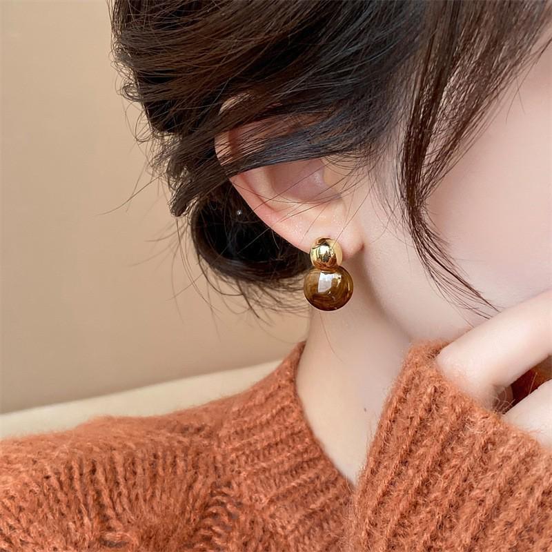 Amber Color Stud Earrings for Women - Retro French Style, Light Luxury Feel, Suited for Square and Round Faces.