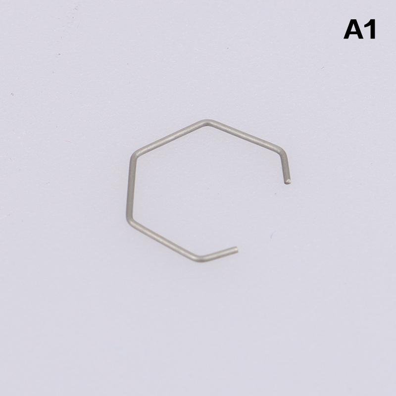 

Стопорная пружина, фрикционная шайба, фиксатор, кулачок, ударный рычаг, подшипник
